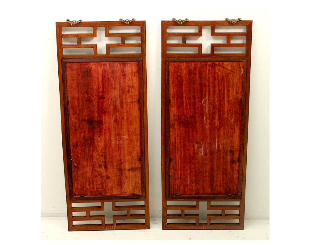 The wood-framed plaques were won by a Canadian bidder acting on behalf of Chinese clients. 