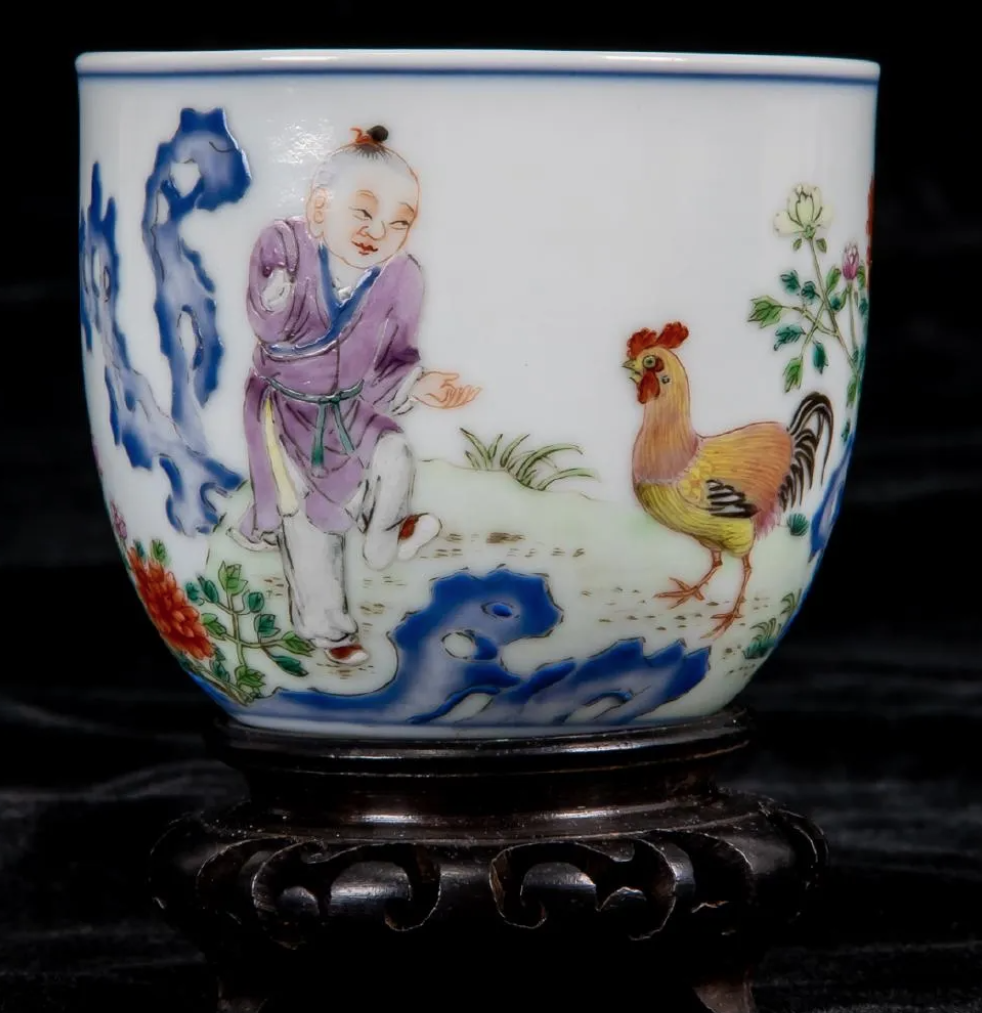 A famille rose Boy and Chicken cup featuring an imperial poem and a Qianlong six-character seal mark and of the period realized $50,000 plus the buyer’s premium in December 2018. Image courtesy of Gray’s Auctioneers and LiveAuctioneers.