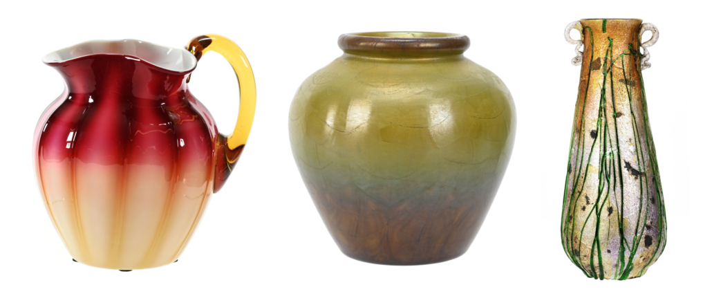 L-R: Plated amberina water pitcher by New England glass, est. $6,000-$10,000; Agate glass vase signed “L. C. Tiffany-Favrile #V586,” est. $4,000-$8,000; Stevens & Williams Silveria art glass vase marked by the maker, est. $4,000-$8,000