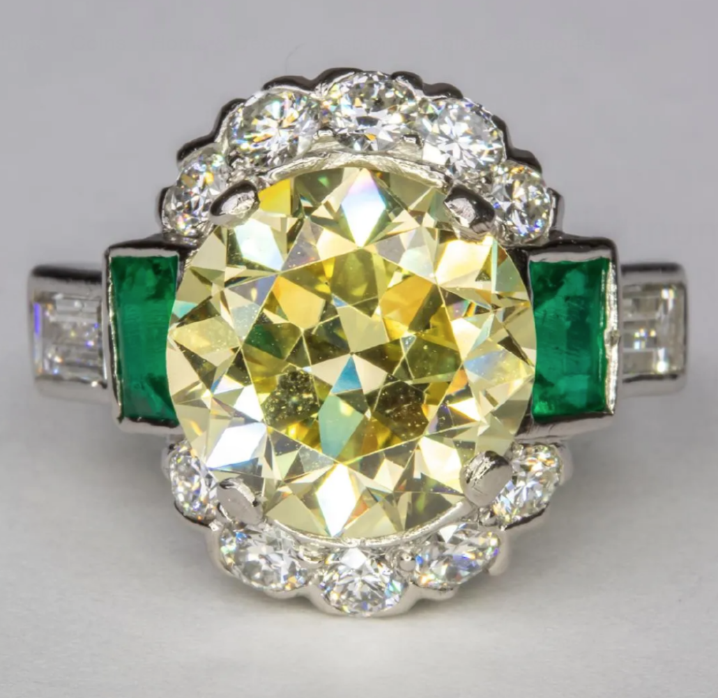 A platinum, diamond and emerald ring set with a yellow diamond weighing more than five carats brought $55,000 plus the buyer’s premium in October 2018. Image courtesy of Gray’s Auctioneers and LiveAuctioneers.