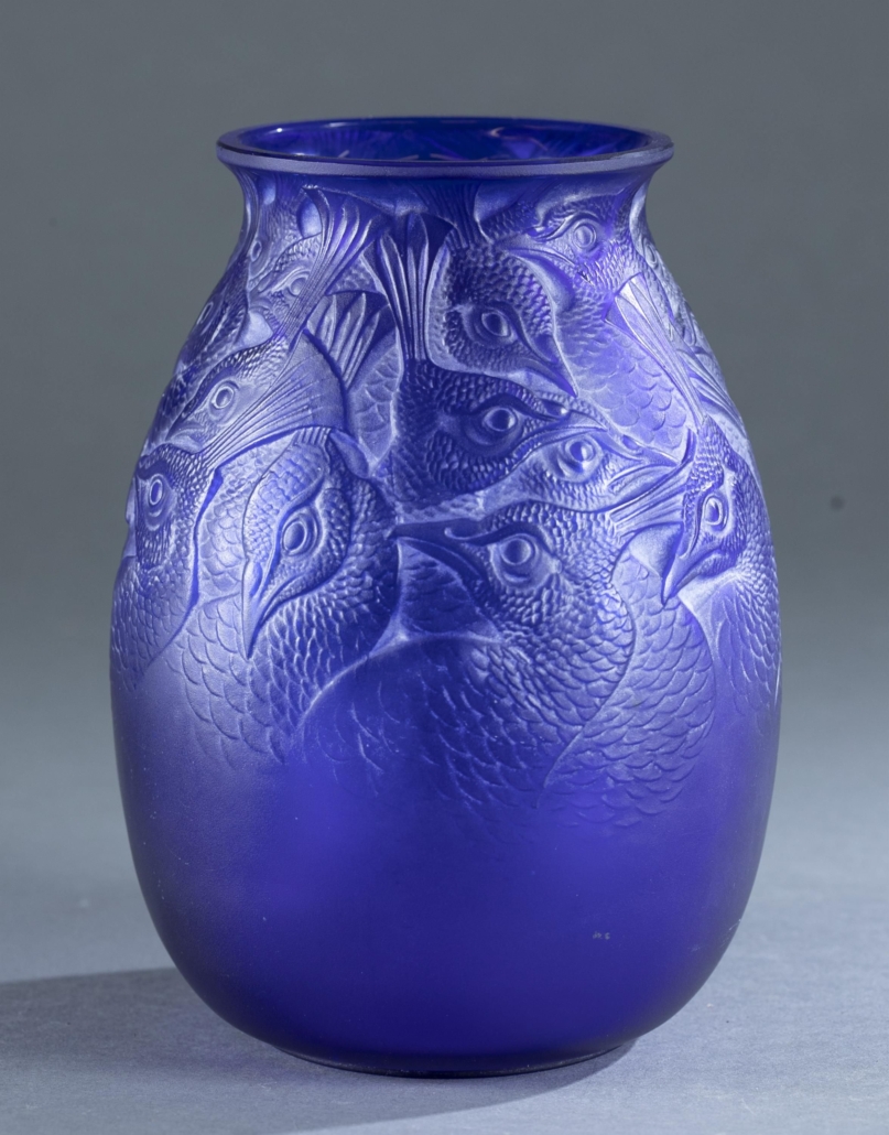 Rene Lalique Borromee blue molded glass vase, est. $10,000-$15,000. Image courtesy of Quinn’s Auction Galleries