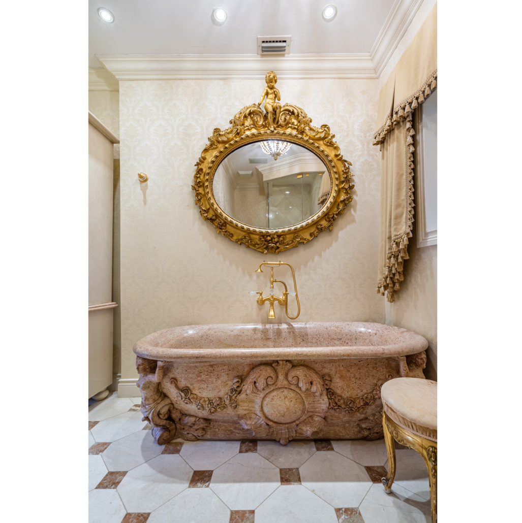 Italian carved rouge marble bath tub, est. $8,000-$12,000. Image courtesy of Hindman