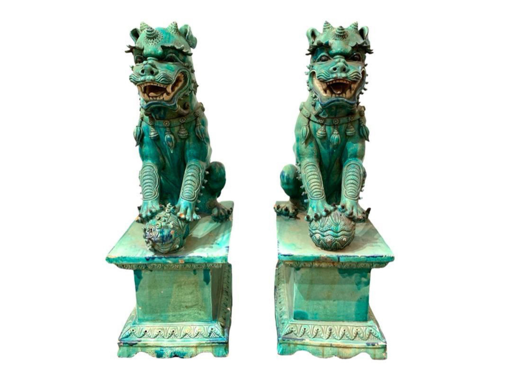 Large pair of Chinese turquoise glaze terracotta foo dogs on stands, $5,842