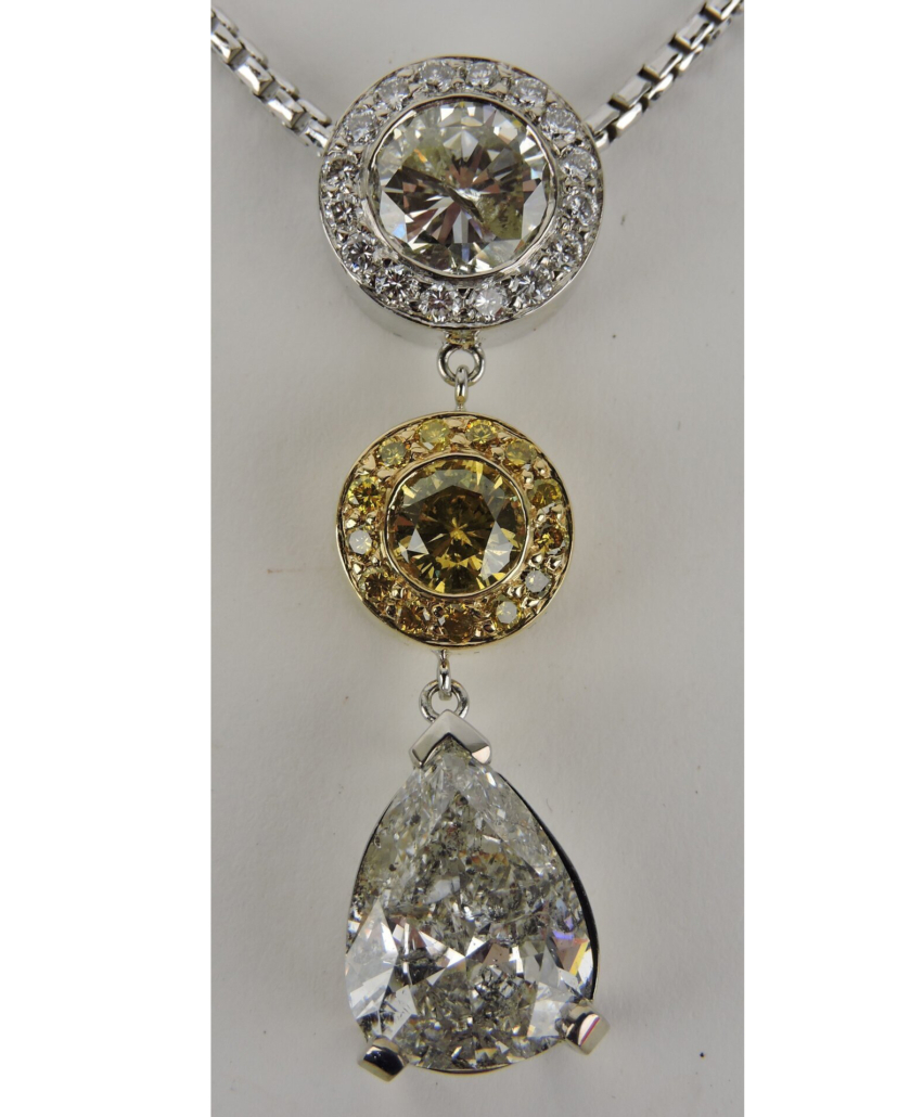 Multi-diamond drop pendant on a 14K white gold chain, est. $20,000-$40,000)