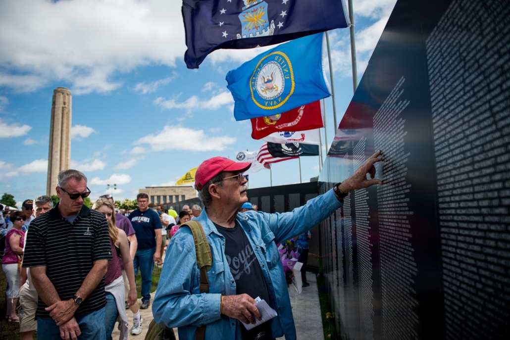 A visitor locates a specific name etched on the American Veterans Traveling Tribute (AVTT) Vietnam Wall, which will be displayed at the National WWI Museum and Memorial during Memorial Day Weekend 2022. Image courtesy of the National WWI Museum and Memorial