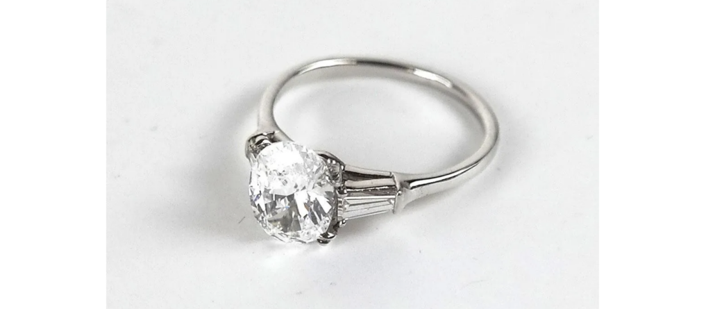  Harry Winston ring with a 1.72-carat oval brilliant cut diamond and its original platinum setting, est. $8,000-$10,000
