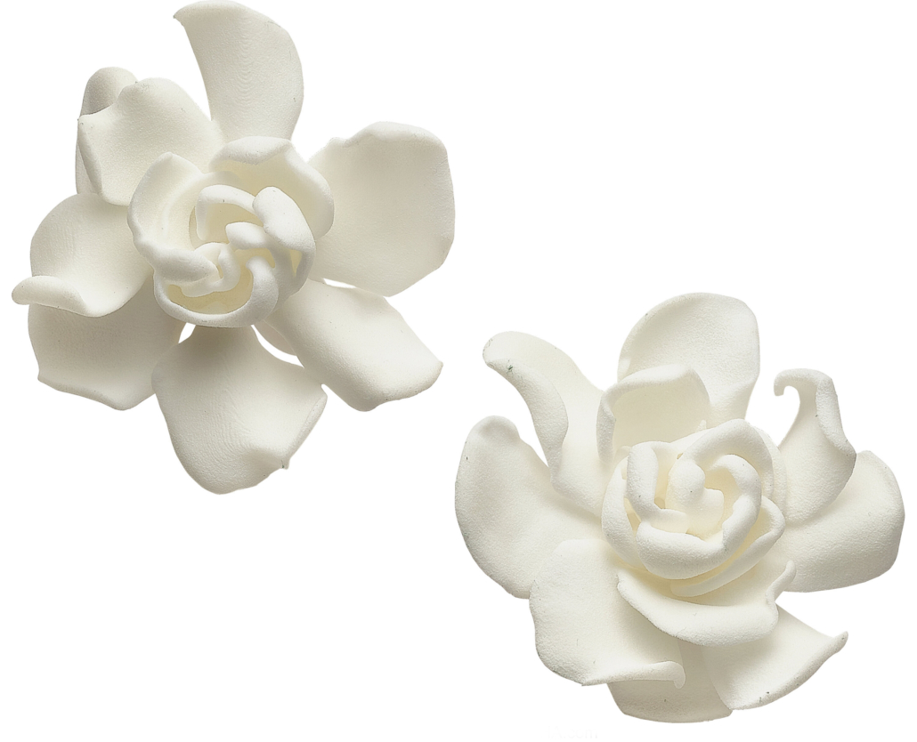 White gardenia resin ear clips by JAR, $20,000. Image courtesy of Heritage Auctions