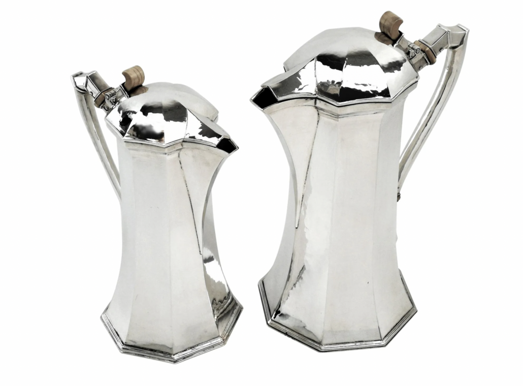 Pair of Arts & Crafts sterling silver ewers by Omar Ramsden, est. $16,000-$19,000