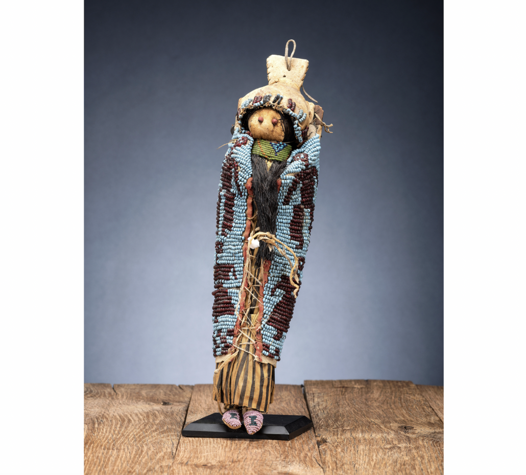 Wasco or Yakima beaded pictorial hide doll cradle, with doll, est. $15,000-$25,000