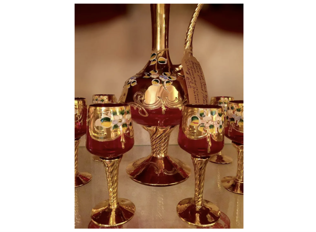 Hand-painted, hand-blown 12-piece decanter and glasses set from the Czech Republic, est. $1,100-$1,500
