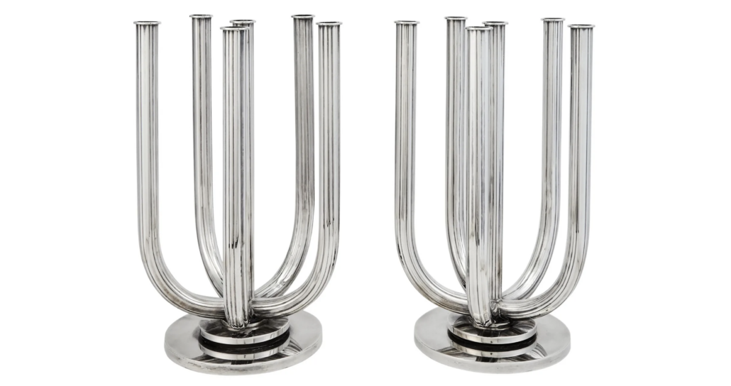 Pair of Georg Jensen six-light candelabra, designed by Harald Nielsen, est. $80,000-$120,000. Image courtesy of Doyle New York and LiveAuctioneers