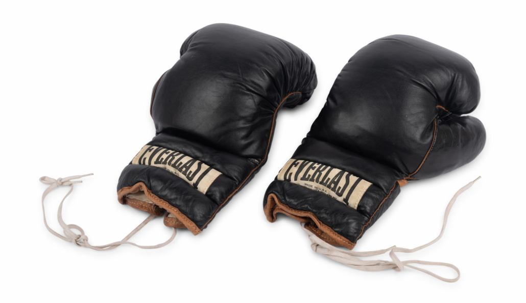 Everlast training boxing gloves used by Muhammad Ali during the 1970s, est. $5,000-$7,000