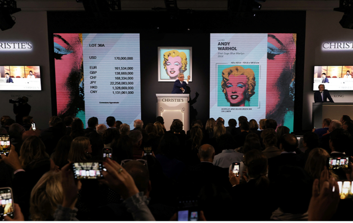 The New York saleroom during the offering of ‘Shot Sage Blue Marilyn’ on the evening of May 9. The Warhol work ultimately sold for $195 million. Image courtesy of Christie’s Images Ltd. 2022