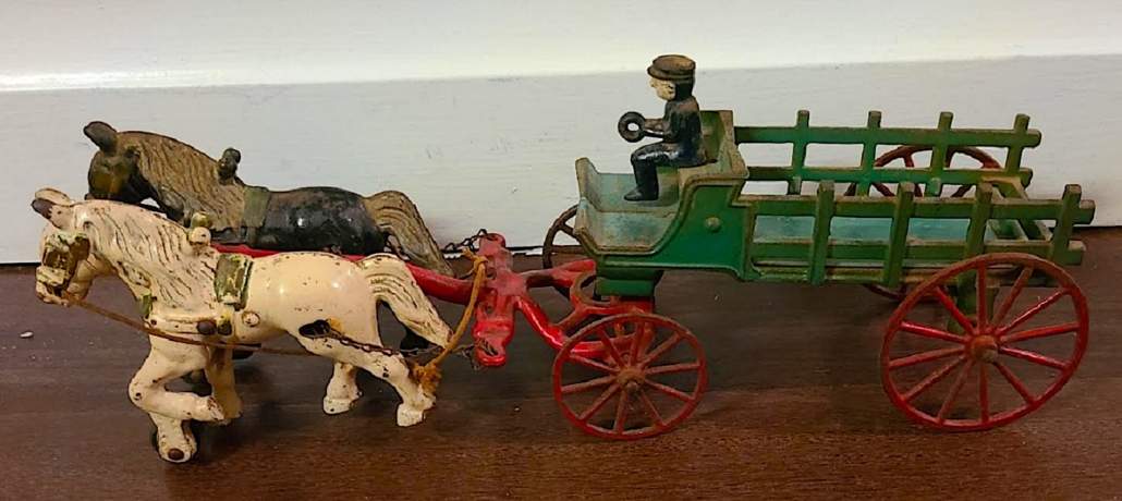 Kenton cast iron horse-drawn carriage toy, est. $1,000-$1,500