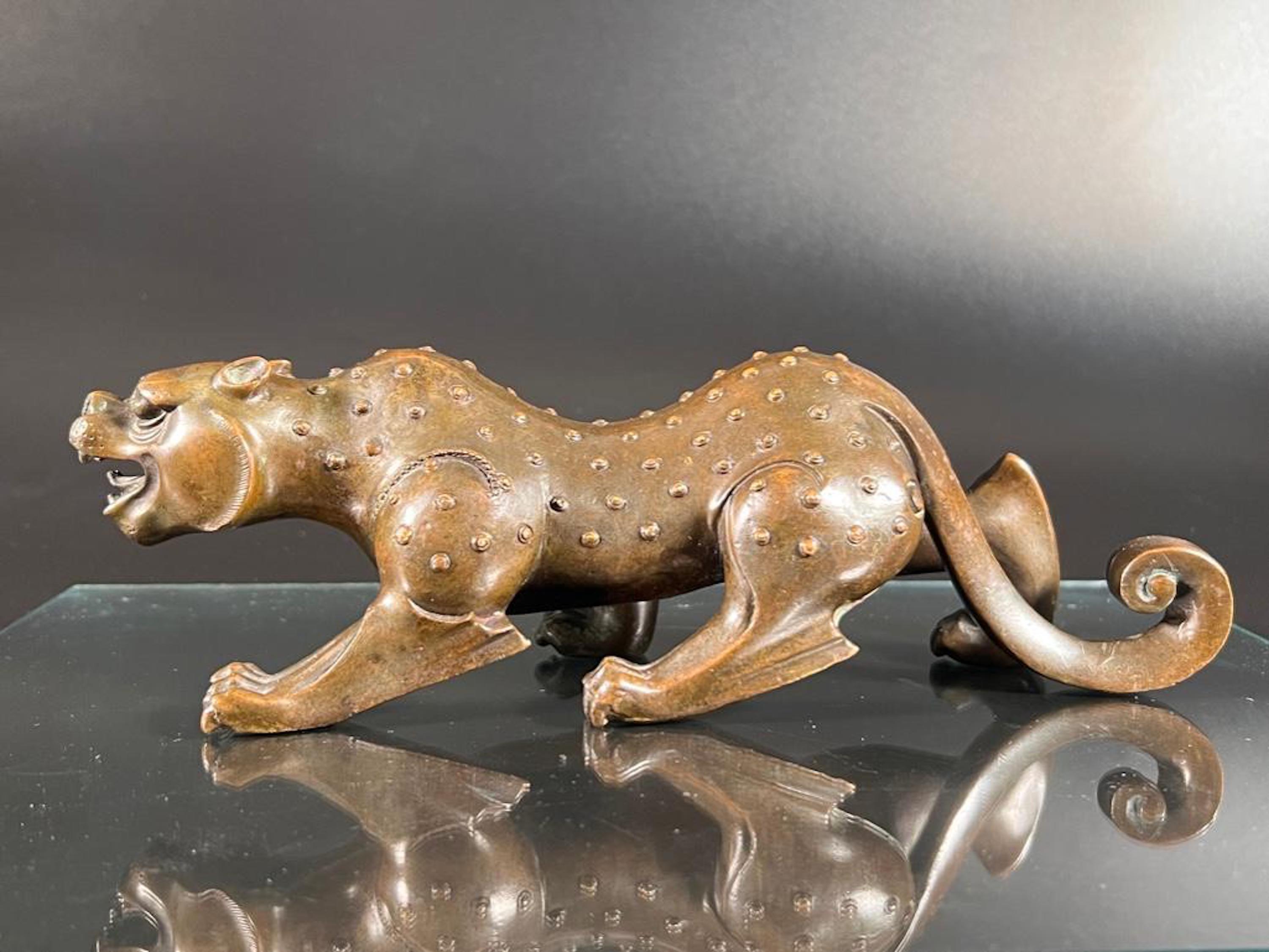 Chinese bronze striding tiger figure, est. $500-$800