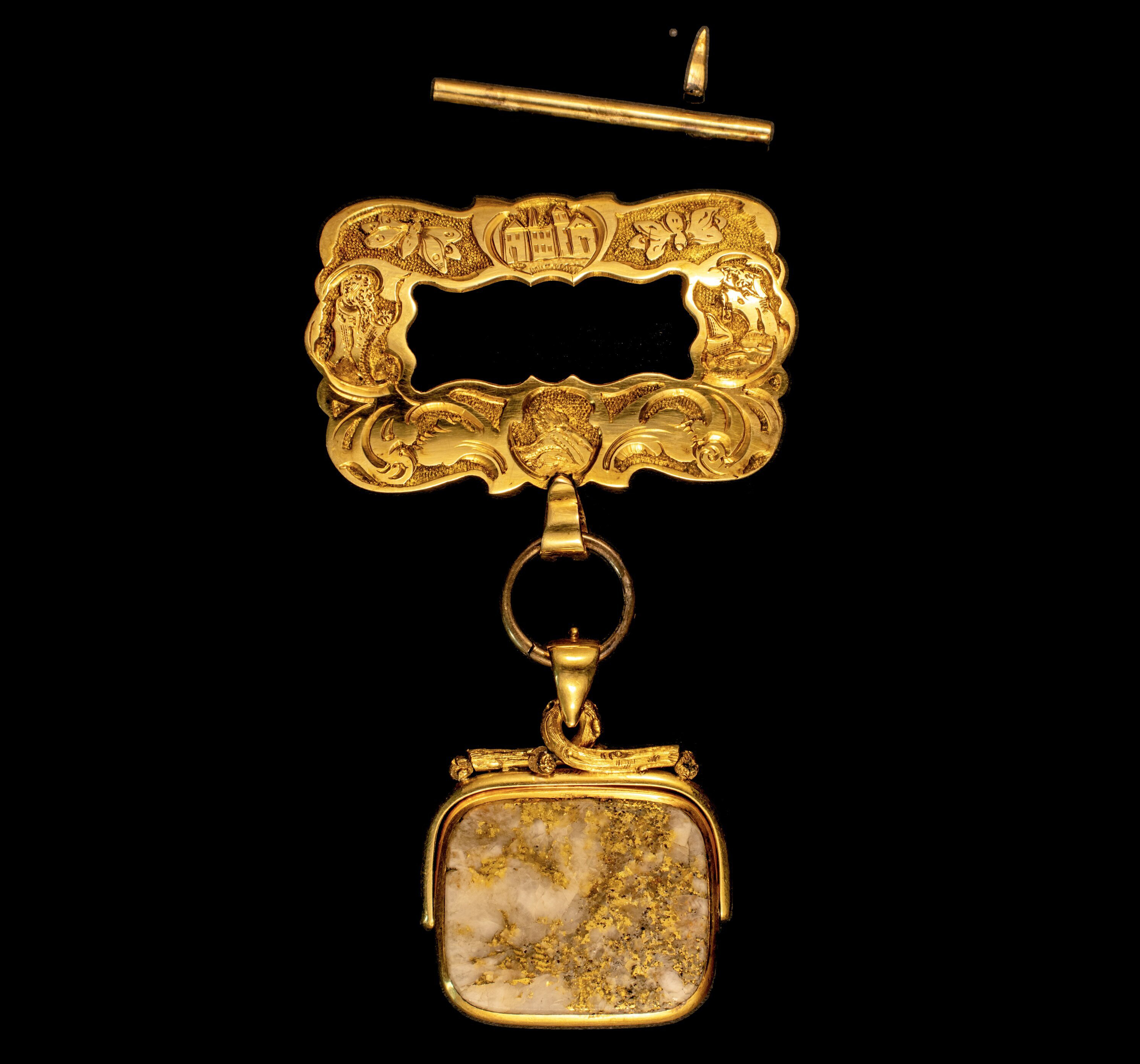 One recovered jewelry item from the SS Central America is a large 18K Gold Rush ore engraved brooch that San Francisco businessman Samuel Brannan was sending to his son in Geneva, Switzerland as a gift for his son's teacher. Photo credit: Holabird Western Americana Collections.