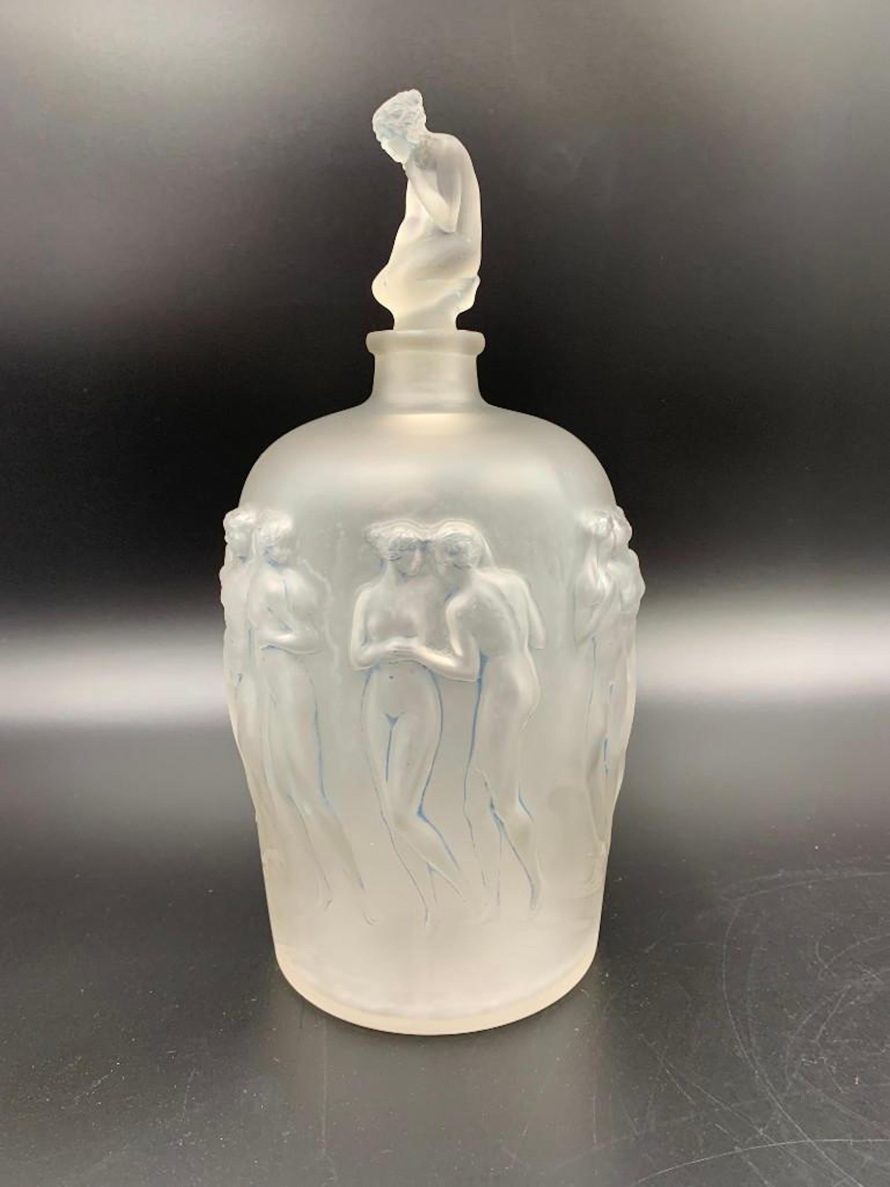Signed R. Lalique large stoppered bottle, titled ‘Douze Figurines Avec Bouchon,’ $2,829