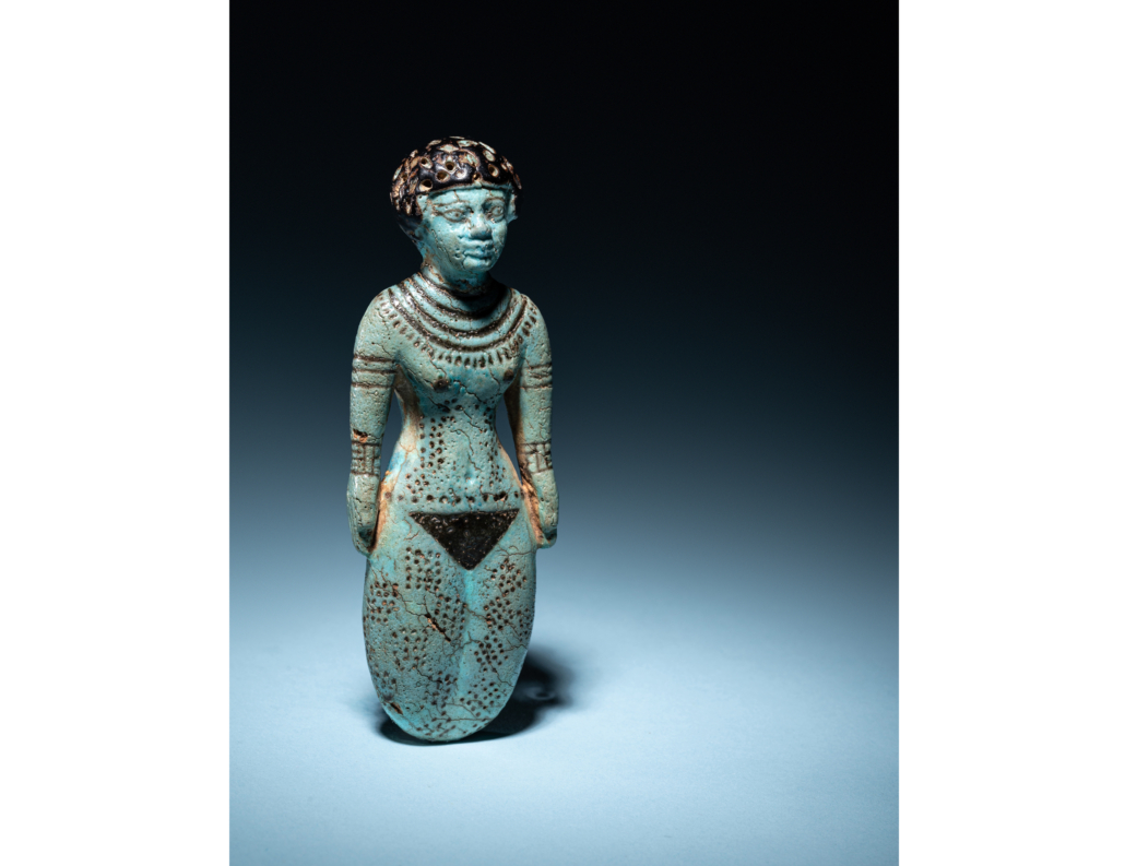 Egyptian faience female figure, $107,500