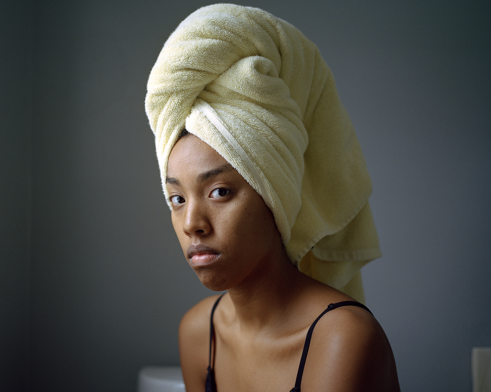 Nadiya Nacorda, ‘Wearing a doek in Lolo and Lola's bathroom,’ 2018. Inkjet print. Collection of the artist. © Nadiya Nacorda, from All the Orchids are Fine series. 