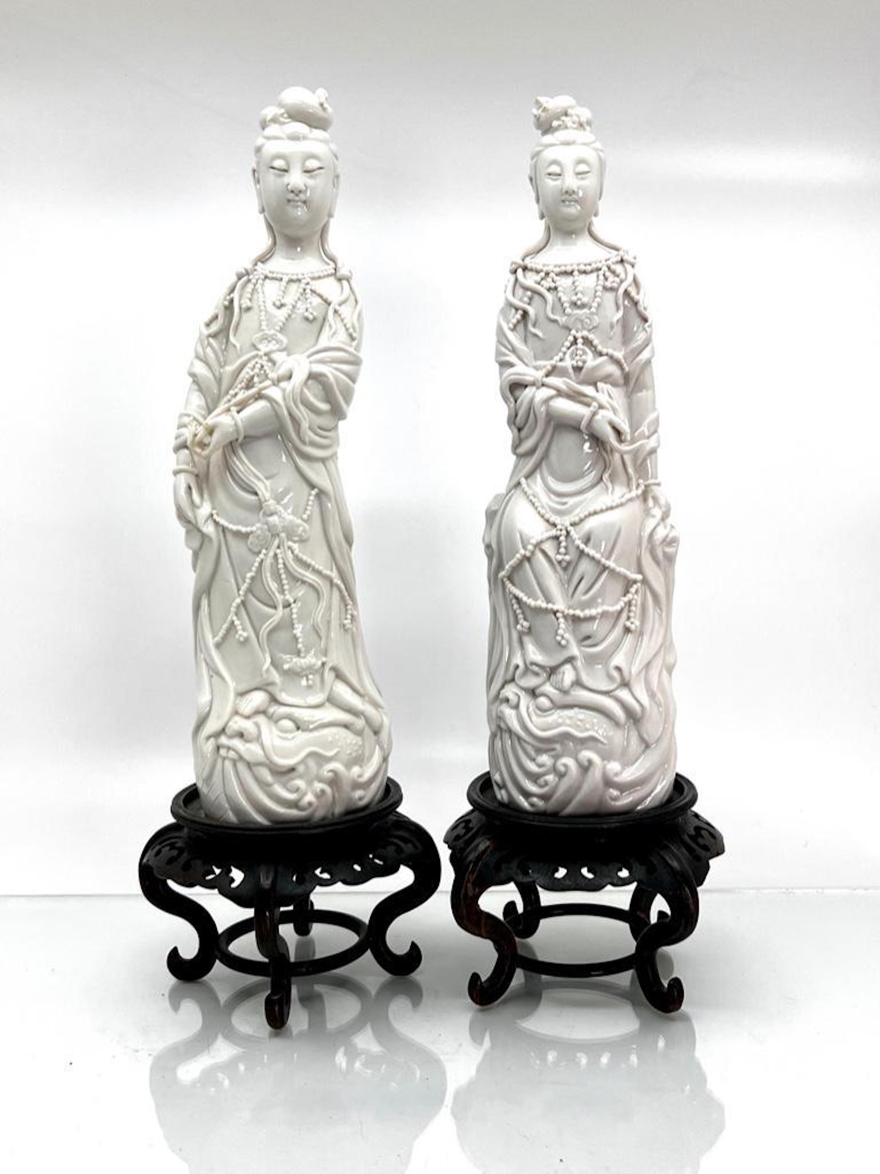 Pair of blanc de chine porcelain Guanyin with stand, est. $100-$200