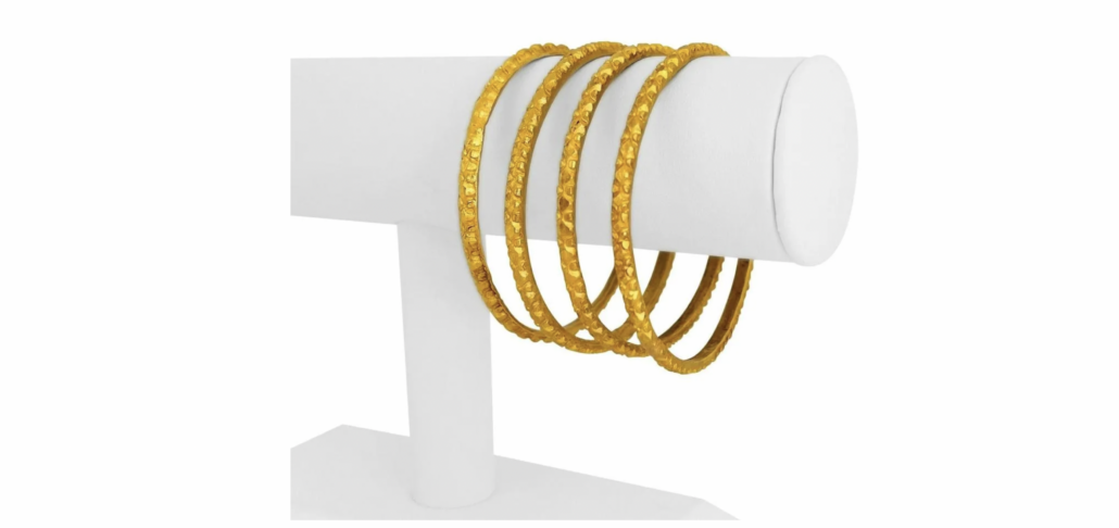 Quartet of 24K gold handmade bangle bracelets, est. $14,000-$17,000