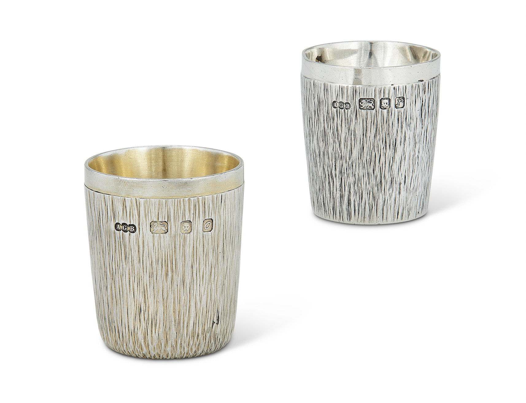 Gerald Benney pair of silver salt and pepper cellars with his signature finish, est. £300-£500