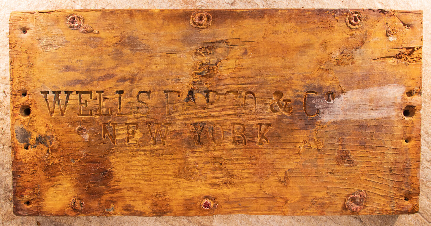 Also recovered from the wreck of the fabled Ship of Gold, the SS Central America, is the lid to the remnants of the oldest known Wells Fargo treasure shipment box. Photo credit: Holabird Western Americana Collections.
