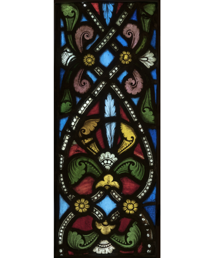 Artist/maker unknown, French. Border panel from the Moses Window, Abbey Church of Saint-Denis, France. Stained glass, circa 1145. 19 1/4 by 9in (48.9 by 22.9cm). On loan from Glencairn Museum, Bryn Athyn, Pennsylvania.