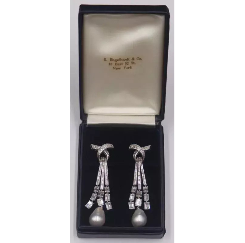 Pair of platinum, diamond and pearl earrings, est. $6,000-$9,000