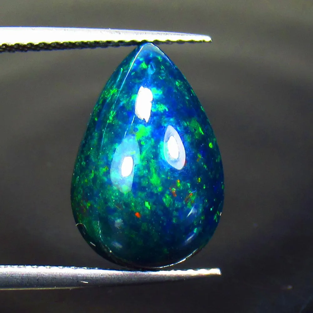 Pear-shape cabochon-cut 6.21-carat black fire opal, est. $150-$200
