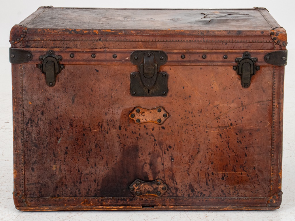 Early Louis Vuitton leather-covered trunk, est. $2,000-$3,000