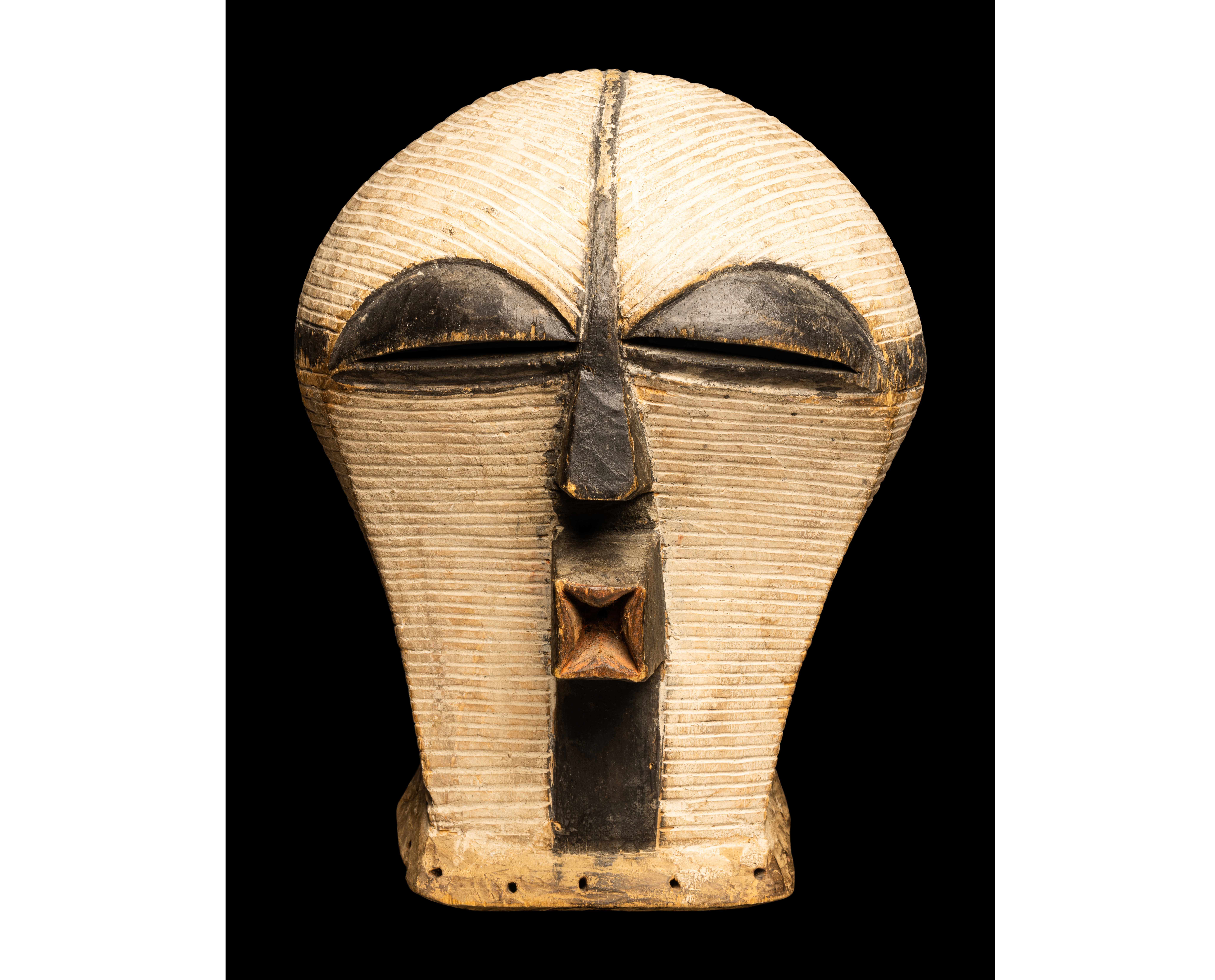 Songye wood female mask (Kifwebe), est. $4,000-$6,000