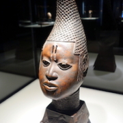 Early 16th-century Benin Kingdom (now Nigeria) bronze bust of a king mother’s iyoba, photographed on display at the Ethnological Museum in Berlin, Germany in November 2014. On July 1, representatives from Germany and Nigeria were set to sign an agreement to return the Benin bronzes to Nigeria. Image courtesy of Wikimedia Commons, photo credit Daderot. Shared under the Creative Commons CC0 1.0 Universal Public Domain Dedication.