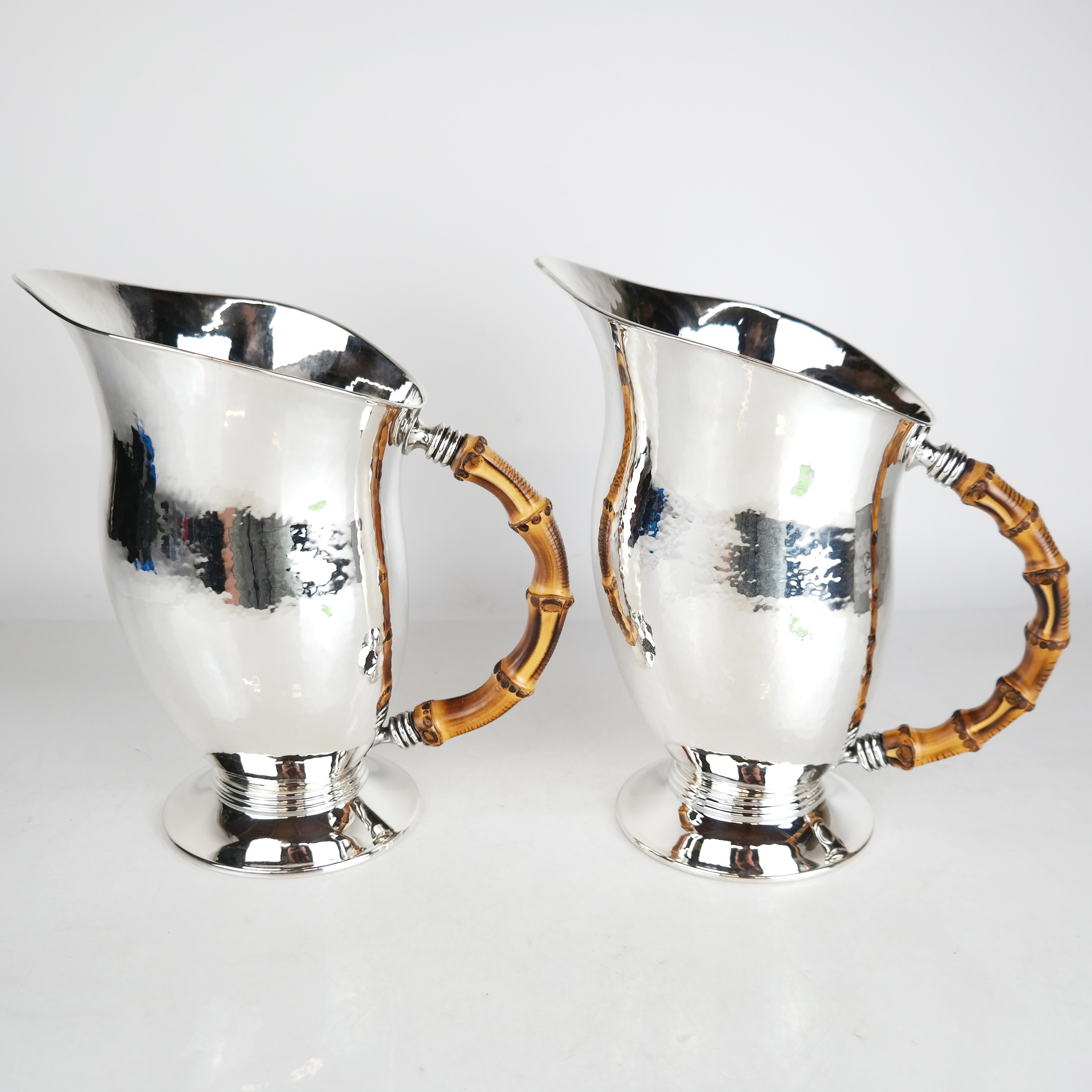 Pair of Buccellati silver pitchers, est. $4,000-$5,000