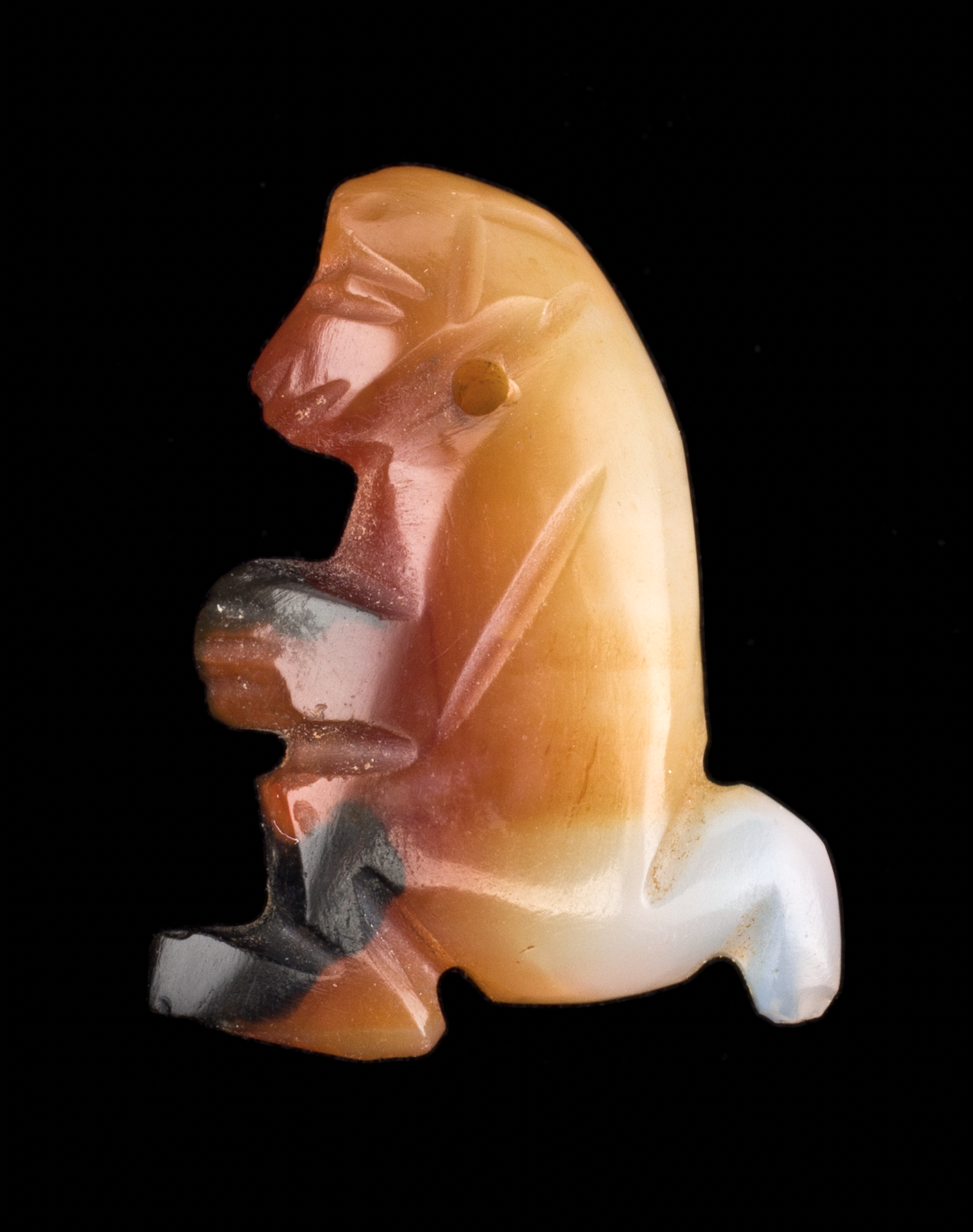 Monkey amulet, ancient Egyptian, Middle Kingdom, about 1980–1760 B.C., carnelian. Mrs. Kingsmill Marrs Collection, Worcester Art Museum, 2001.124 