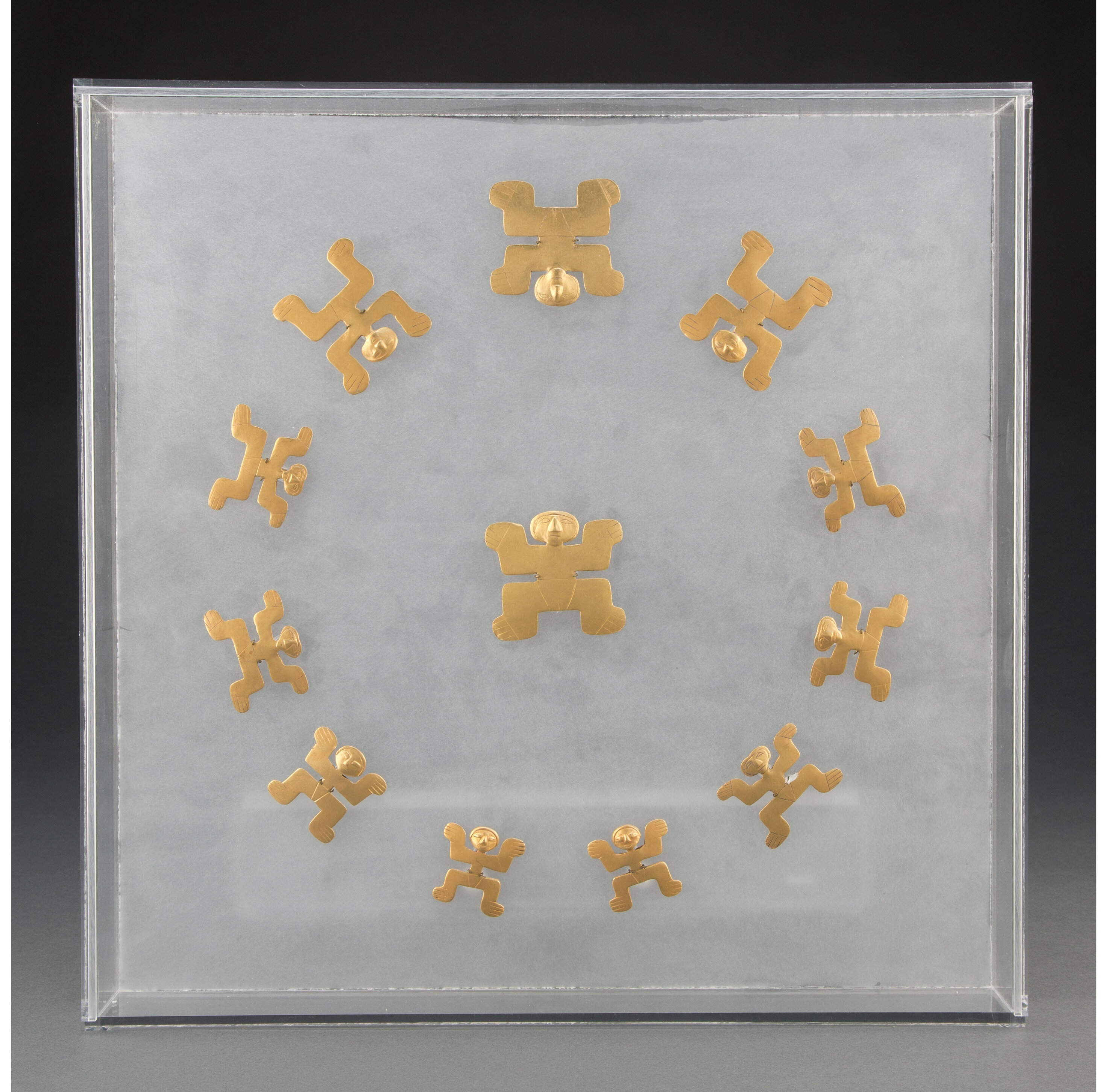Set of 12 Tolima gold pendants, est. $30,000-$50,000. Image courtesy of Heritage Auctions