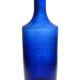 Circa-1860s Vincent Squarza blue glass medicine bottle, one of five known, and one of the many examples that will be on view at the 2022 National Antique Bottle Convention in Reno, Nevada, taking place from July 28-31. Image courtesy of the Federation of Historical Bottle Collectors (FOHBC).