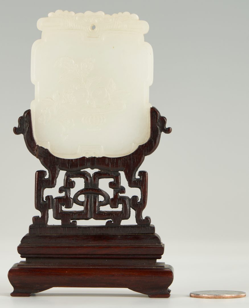 Chinese white jade pendant, $26,400