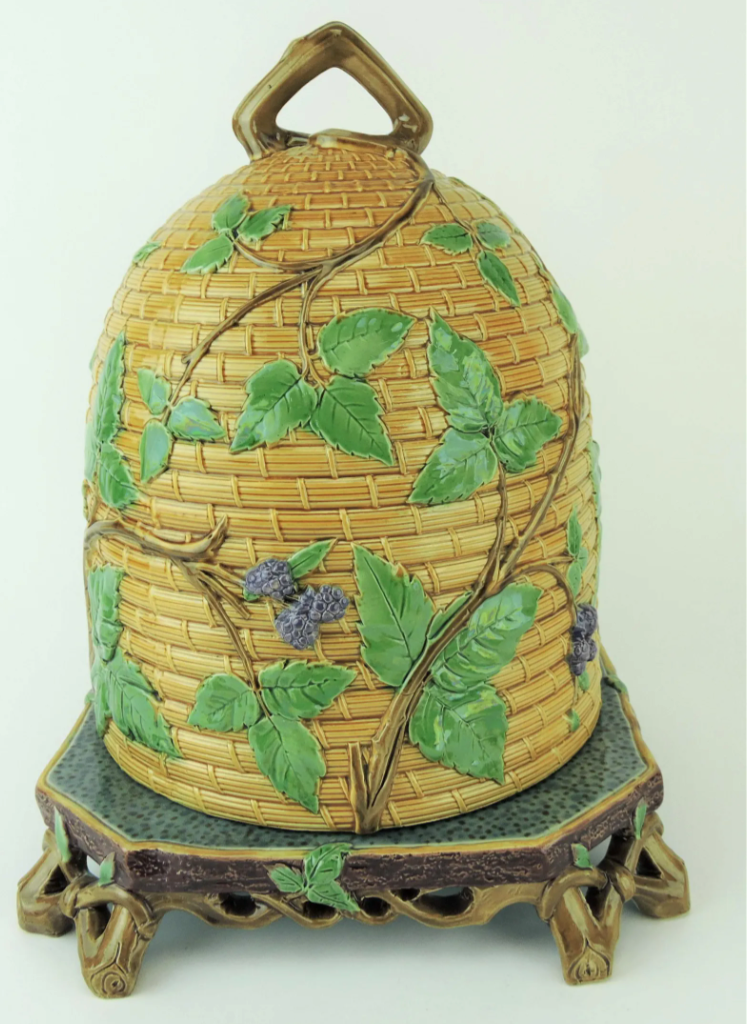 A Minton beehive cheese dish and cover, featuring blackberries in relief on a branch, attained $24,000 plus the buyer’s premium in May 2022. Image courtesy of Strawser Auction Group and LiveAuctioneers.