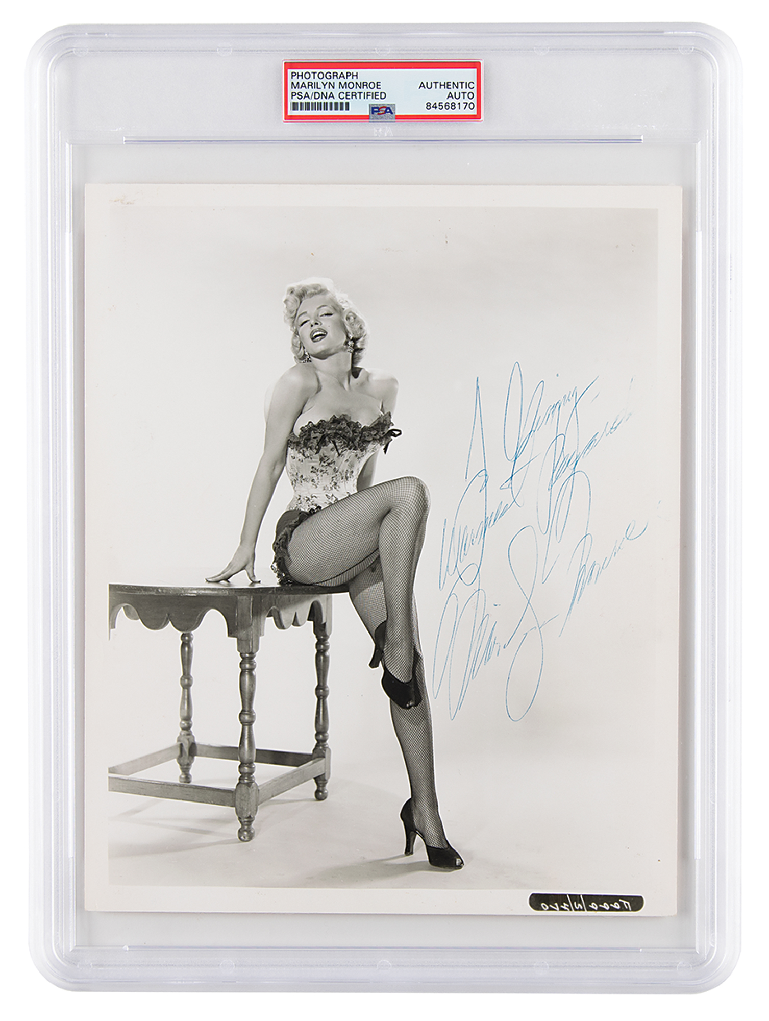 Marilyn Monroe-signed photograph depicting her in character from the 1954 film ‘River of No Return,’ $20,660