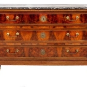 One of two Directoire brass-mounted mahogany commodes, est. $1,500-$2,500