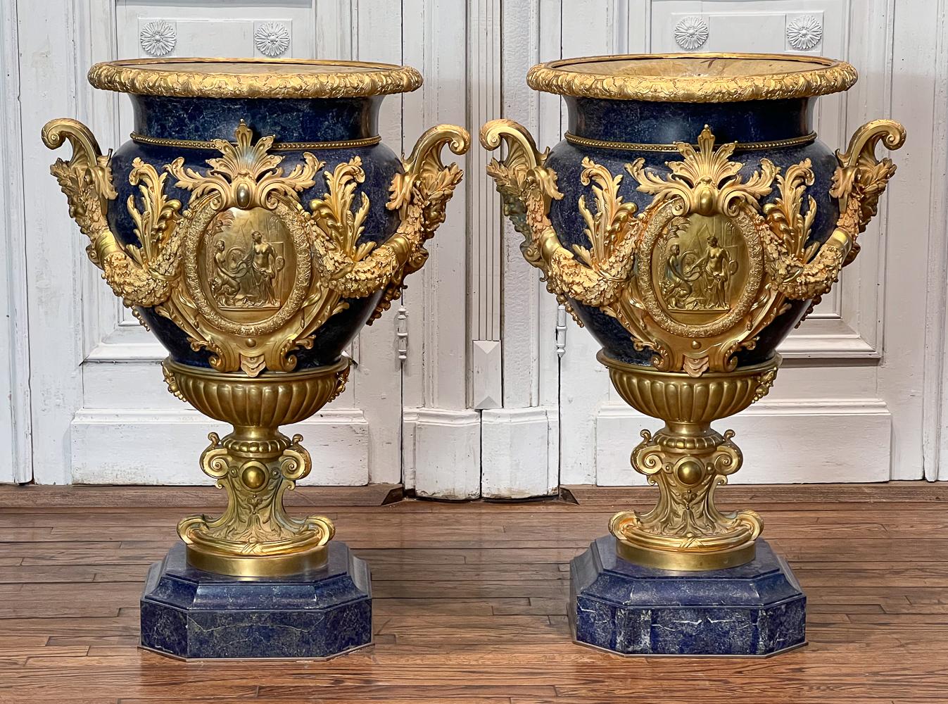 Pair of monumental 20th-century lapis lazuli gilt bronze urns, est. $100-$50,000
