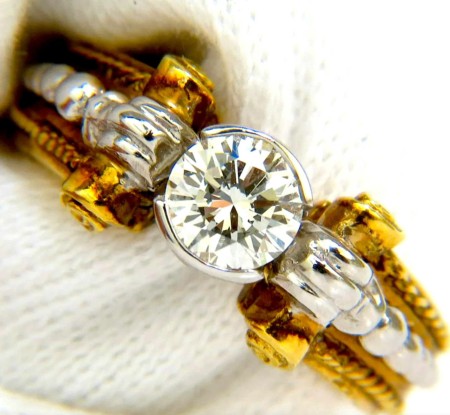 18K gold and white gold ring sporting an H-color, Vs-2 clarity 0.73-carat diamond, est. $5,500-$7,000