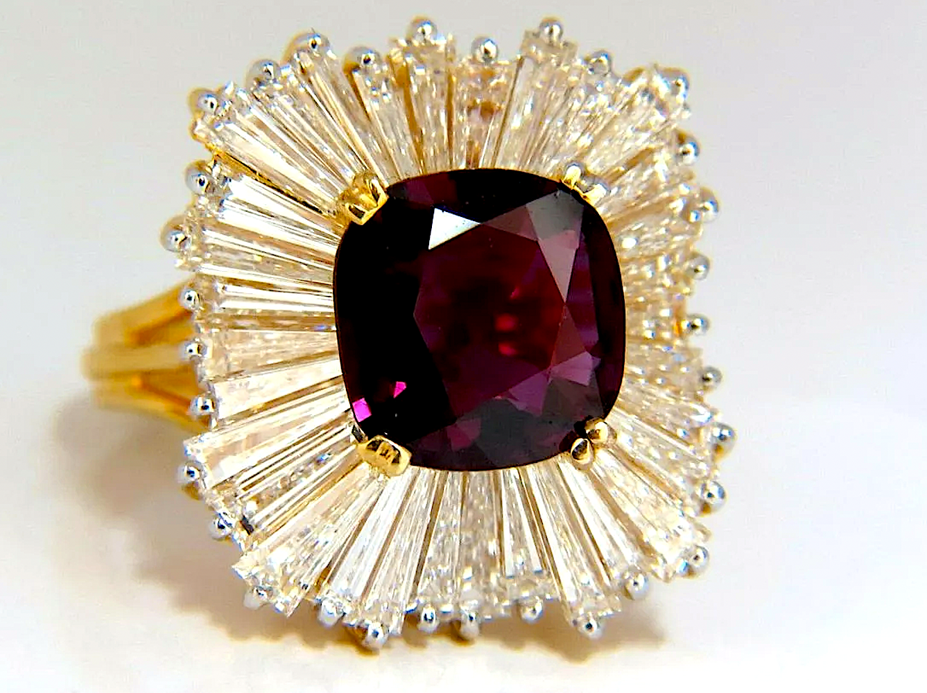 GIA-certified 3.08-carat ruby set in an 18K gold ring with diamonds, est. $24,000-$29,000