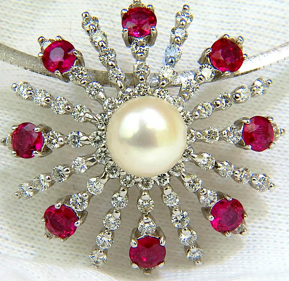 Starburst-form 14K white gold, cultured pearl, ruby and diamond pendant and necklace, est. $4,000-$5,000