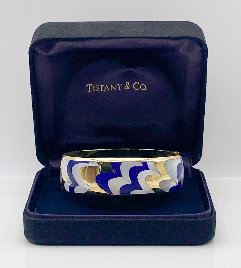  Tiffany & Co. 18K gold with lapis and mother of pearl bangle, likely designed by Angela Cummings, est. $20,000-$25,000