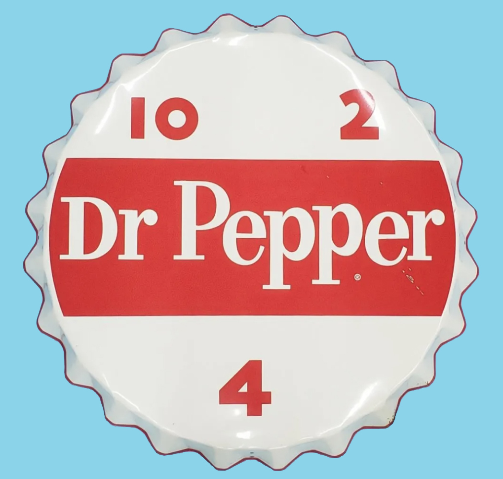 A large Dr Pepper bottle cap-form tin sign, measuring 39in, achieved $3,500 plus the buyer’s premium in October 2021. Image courtesy of Rockabilly Auction Company and LiveAuctioneers.
