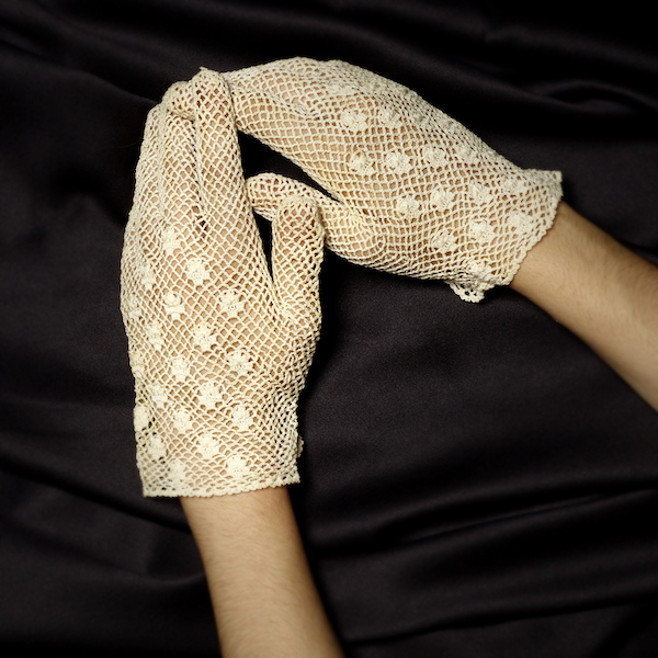 Pair of cream-colored lace gloves belonging to Ruth Bader Ginsburg, $12,750. Image courtesy of Bonhams
