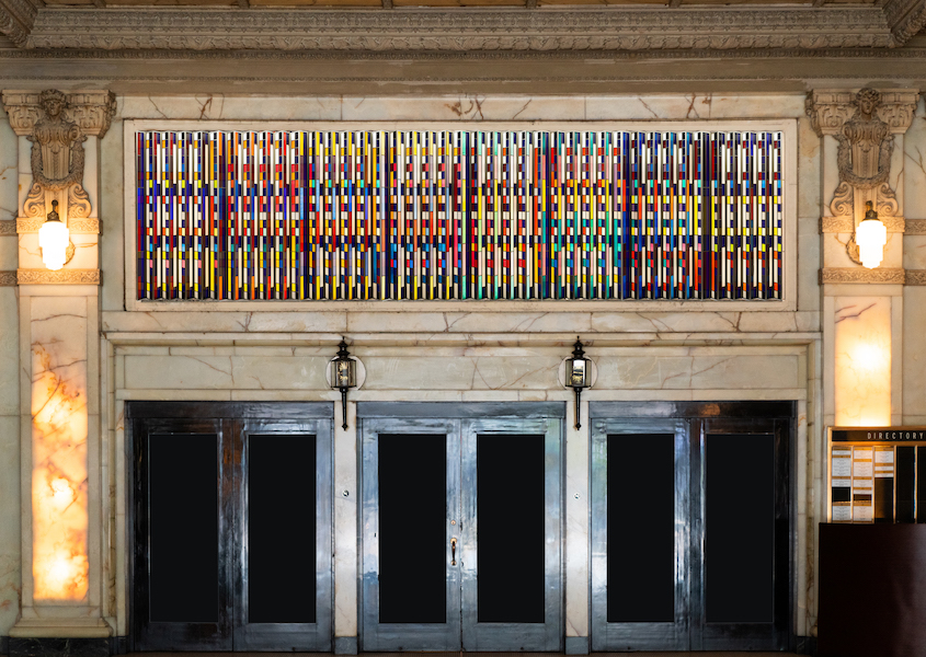 In situ photograph of Yaacov Agam’s double-sided polymorph window installation at the Spreckels Theater in San Diego, estimated at $200,000-$300,000