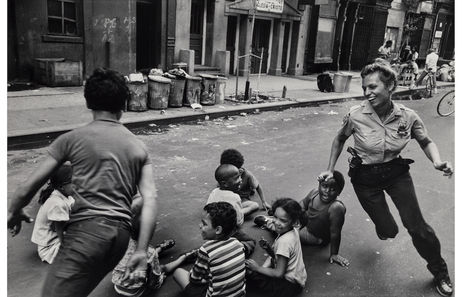 Leonard Freed, ‘Officer Playing with Neighborhood Children,’ from his Police Work series, estimated at $1,500-$2,500. Image courtesy of Heritage Auctions